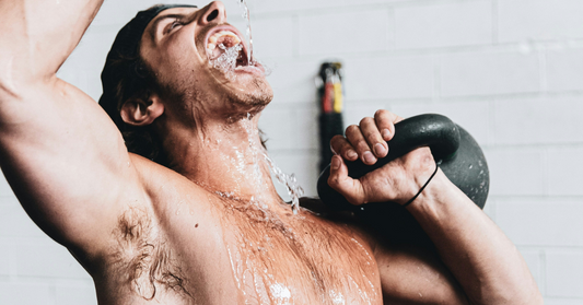 Man drinking water during a workout