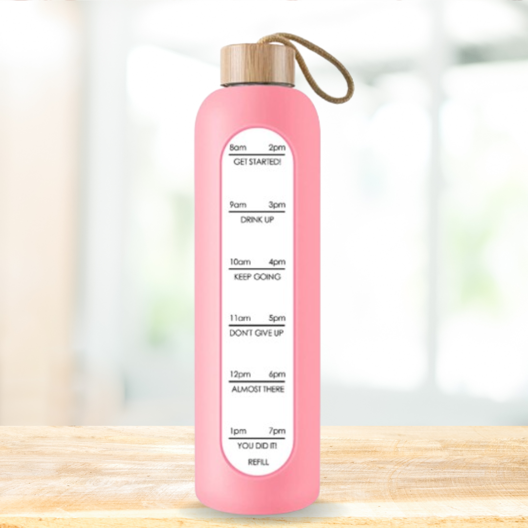 Glass bottle with non-slip protective sleeve and helpful time markers