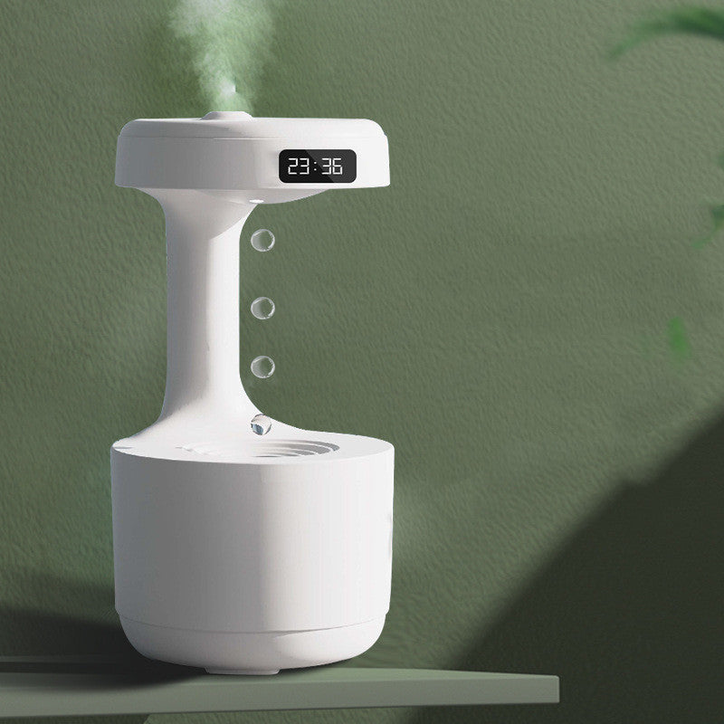 Fascinating humidifier with gravity defying water motion and integrated clock - Plenish