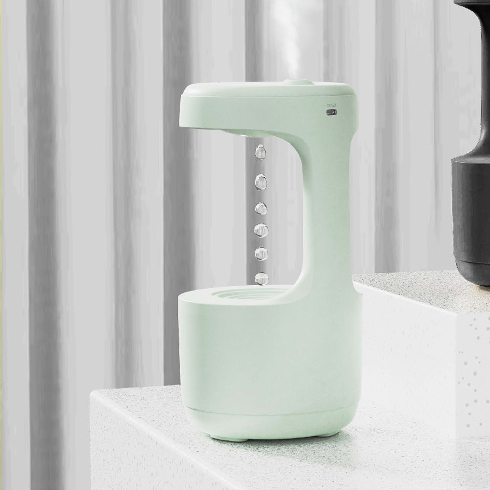 Fascinating humidifier with gravity defying water motion and integrated clock - Plenish