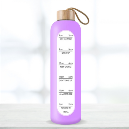 Glass bottle with non-slip protective sleeve and helpful time markers