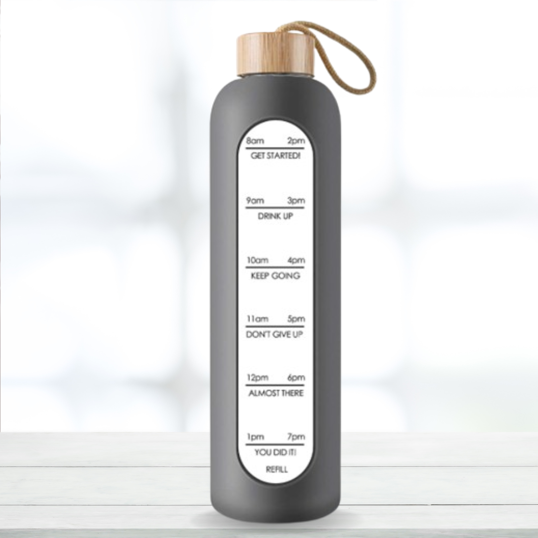 Glass bottle with non-slip protective sleeve and helpful time markers