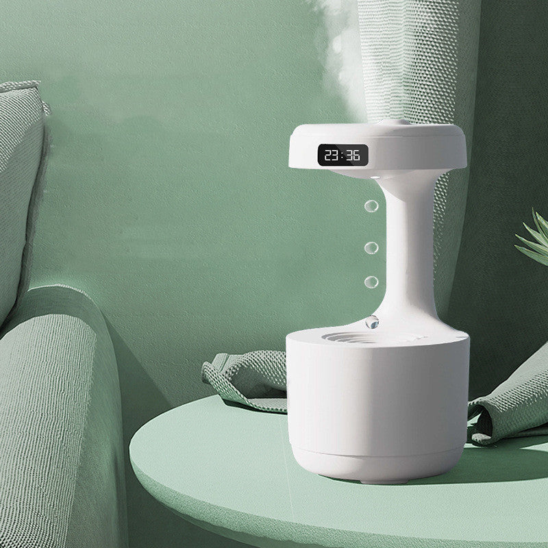 Fascinating humidifier with gravity defying water motion and integrated clock - Plenish