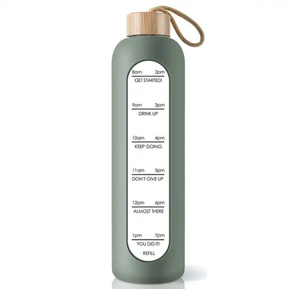 Glass bottle with non-slip protective sleeve and helpful time markers