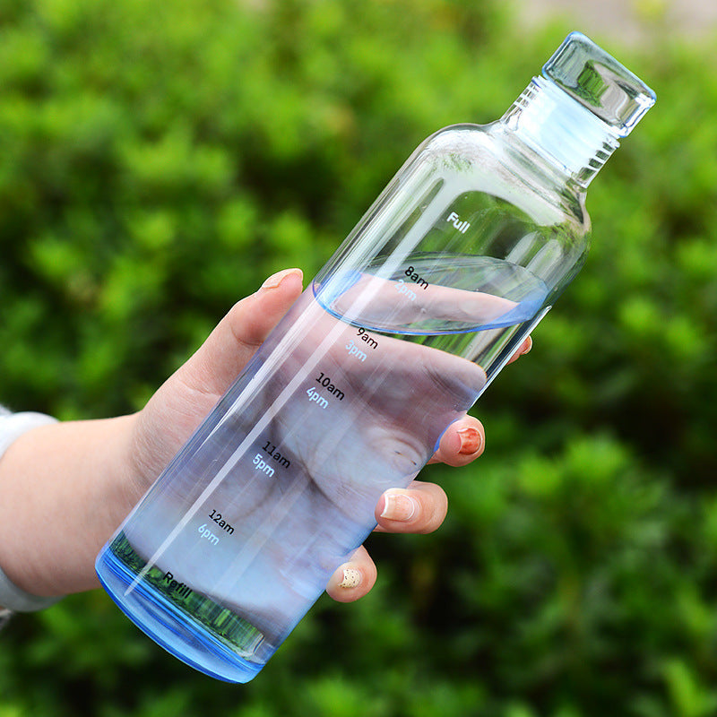 Stylish and minimalist glass water bottle with clever time markers - Plenish