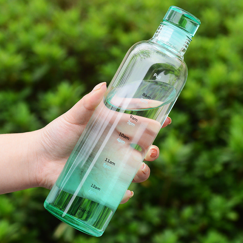 Stylish and minimalist glass water bottle with clever time markers - Plenish