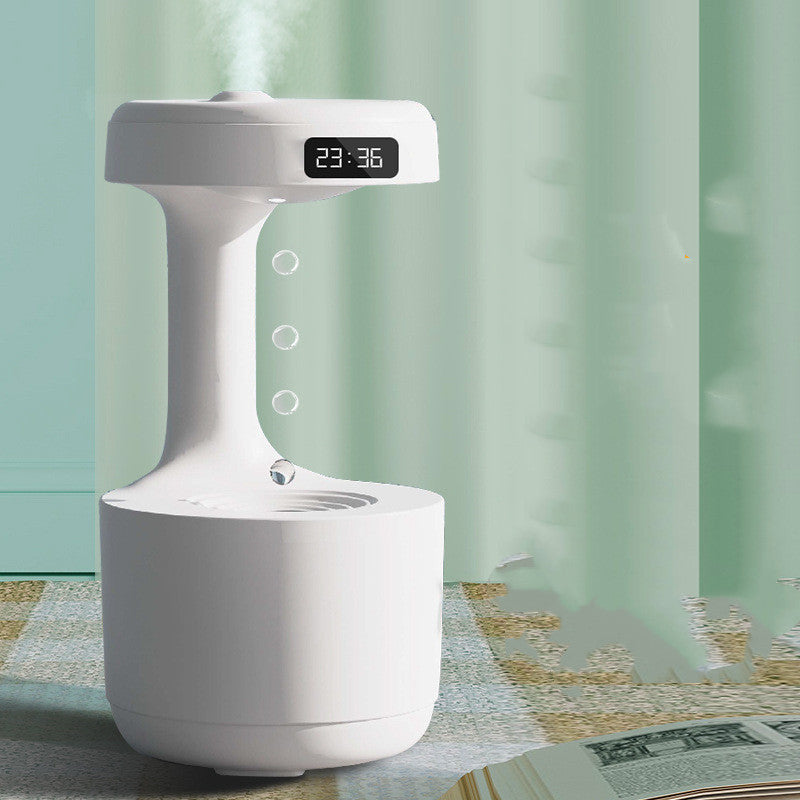 Fascinating humidifier with gravity defying water motion and integrated clock - Plenish