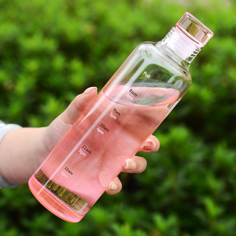 Stylish and minimalist glass water bottle with clever time markers - Plenish