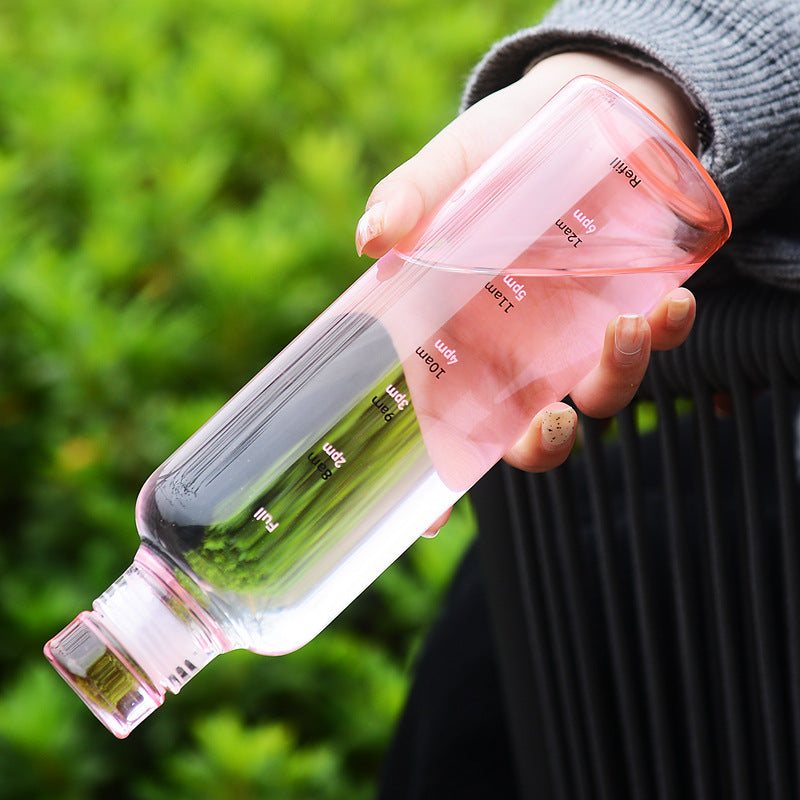 Stylish and minimalist glass water bottle with clever time markers - Plenish