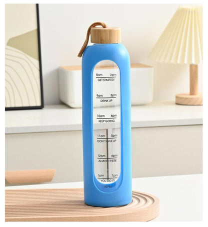 Glass bottle with non-slip protective sleeve and helpful time markers